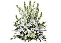 Composizione funebre di fiori bianchi